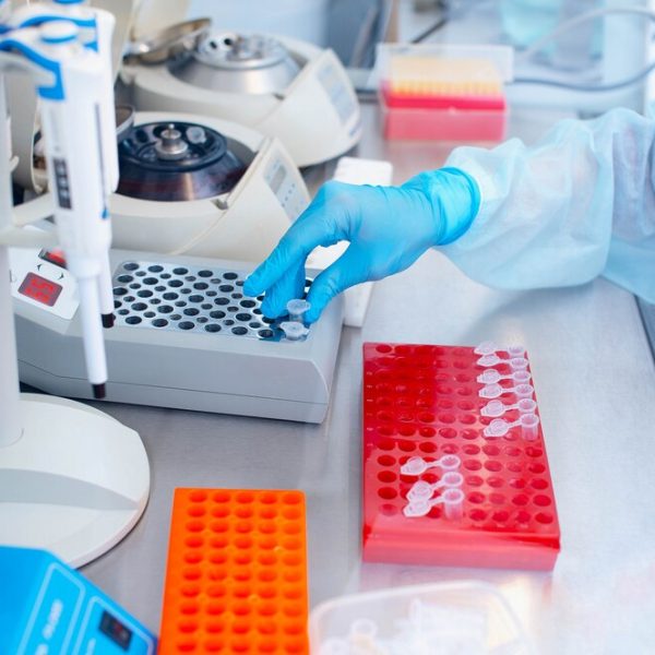 laboratory-technician-with-dispenser-his-hands_97875-279